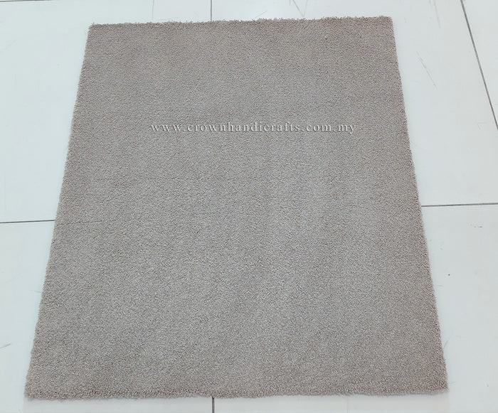 Soft brown square shag rug with even plush pile, top view