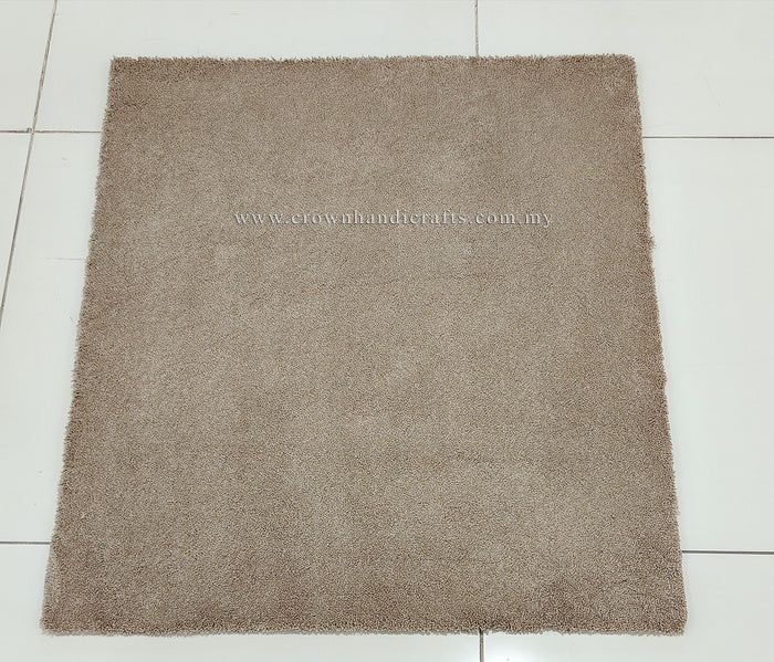 Soft shaggy accent rug with dense short pile, taupe brown square, centered view