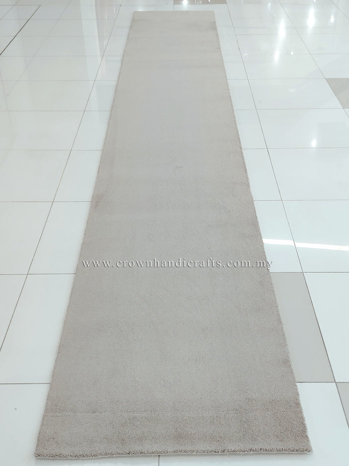 Taupe long shaggy runner rug full length, low pile with straight borders