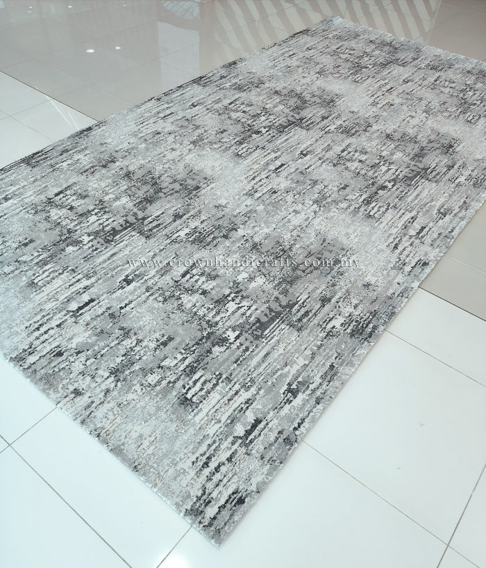Grey abstract area rug with distressed pattern, rectangular