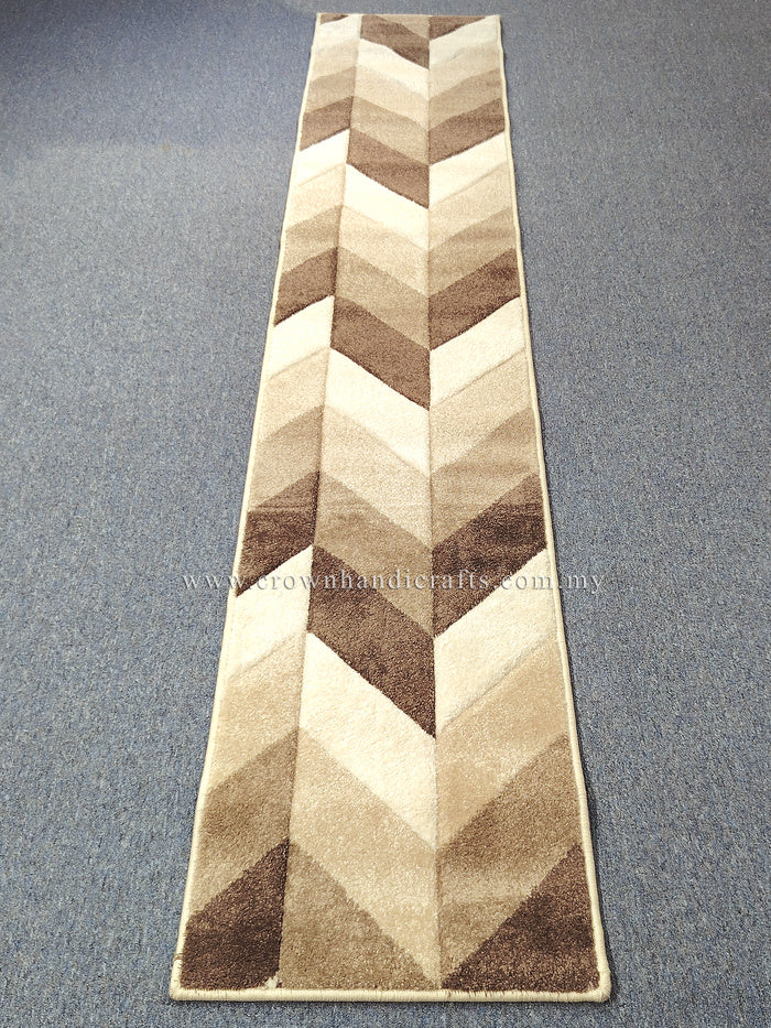 Narrow runner rug with bold chevron pattern in bone, beige and dark brown tones.