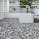 Silver grey abstract textured carpet tile with mottled pattern, full floor view